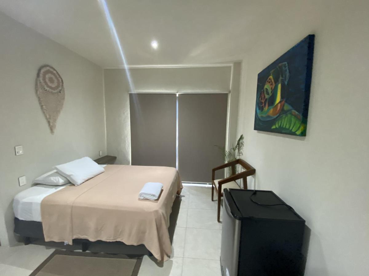 Cuxos Hotel Beachfront Исла-Мухерес Экстерьер фото